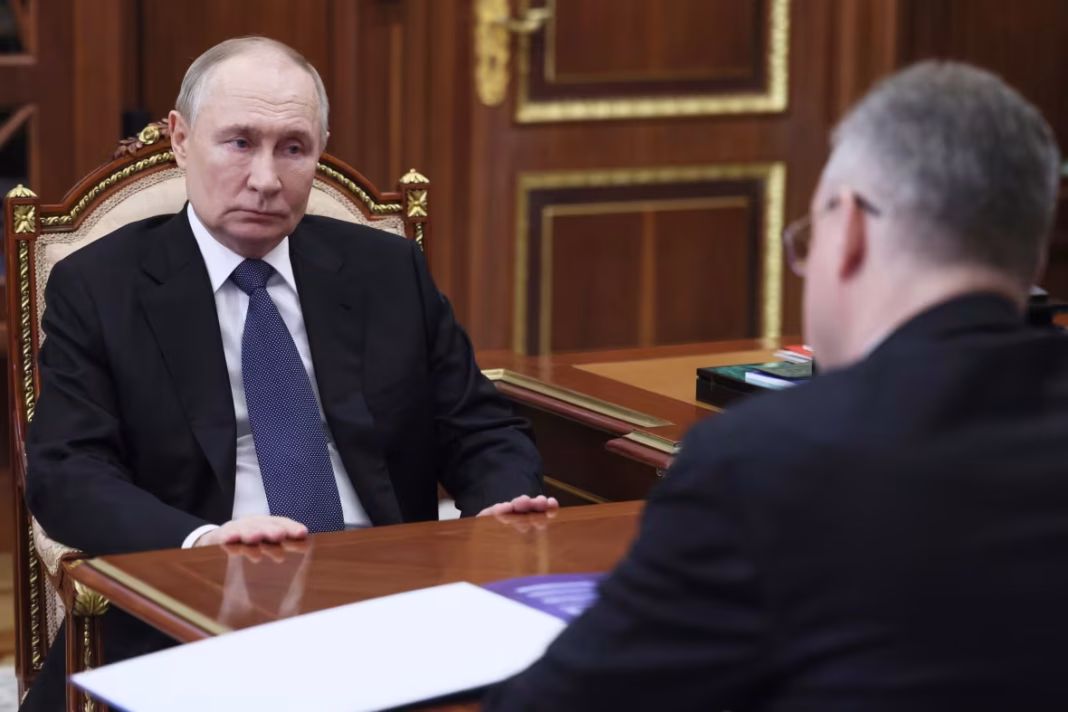 russian-president-vladimir-putin-speaks-to-a-russian-governor-at-the-kremlin